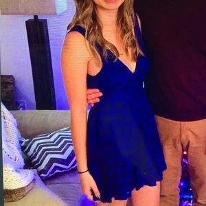 Finn & Clover blue patterned dress with low V.